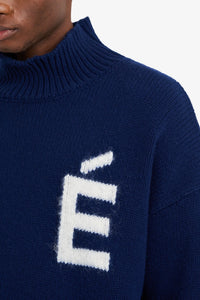 Études Turtle Neck Sweater